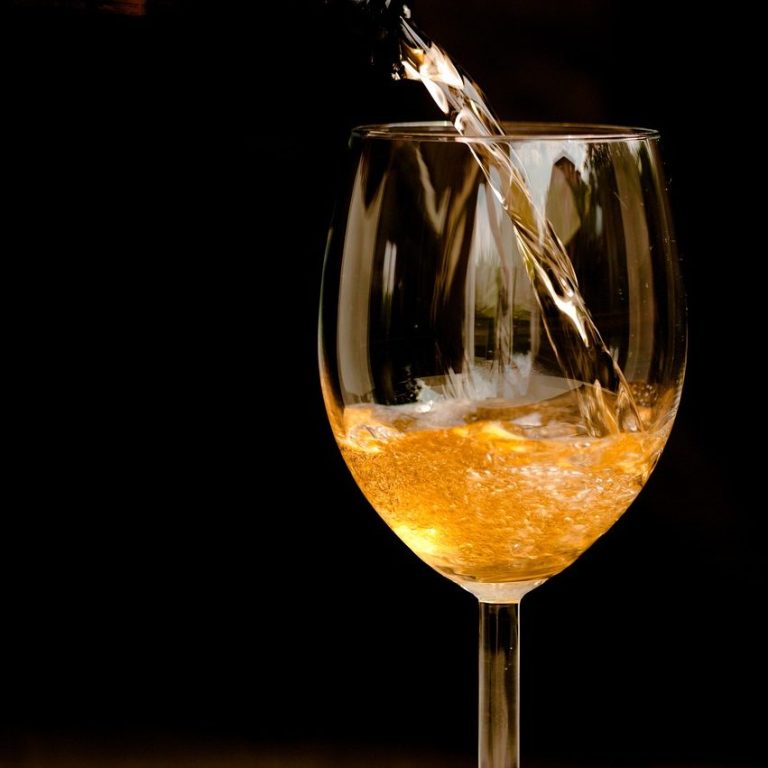 Cider being poured into a glass